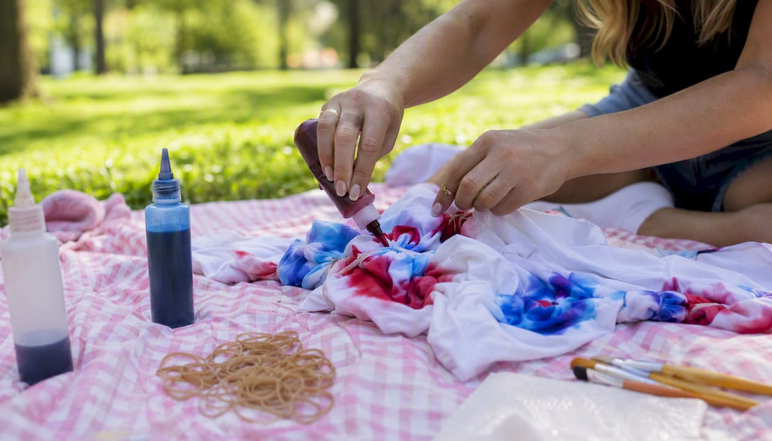 Hands tie-dyeing patriotic shirt