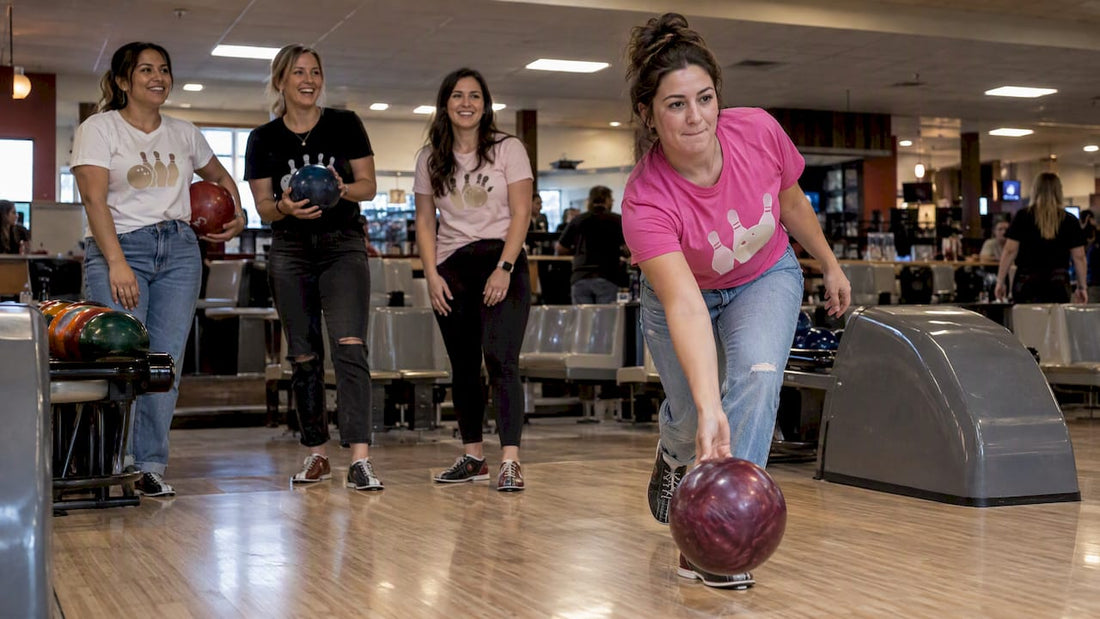 Friends bowling in coordinated custom night shirts